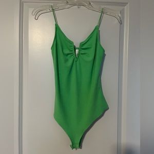 green bodysuit
